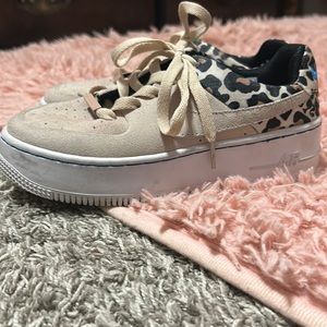I’m selling 5.5 women’s, custom Air Force 1’s with animal print and blue accents